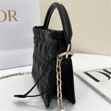 lady dior top handle drawstring mini bag